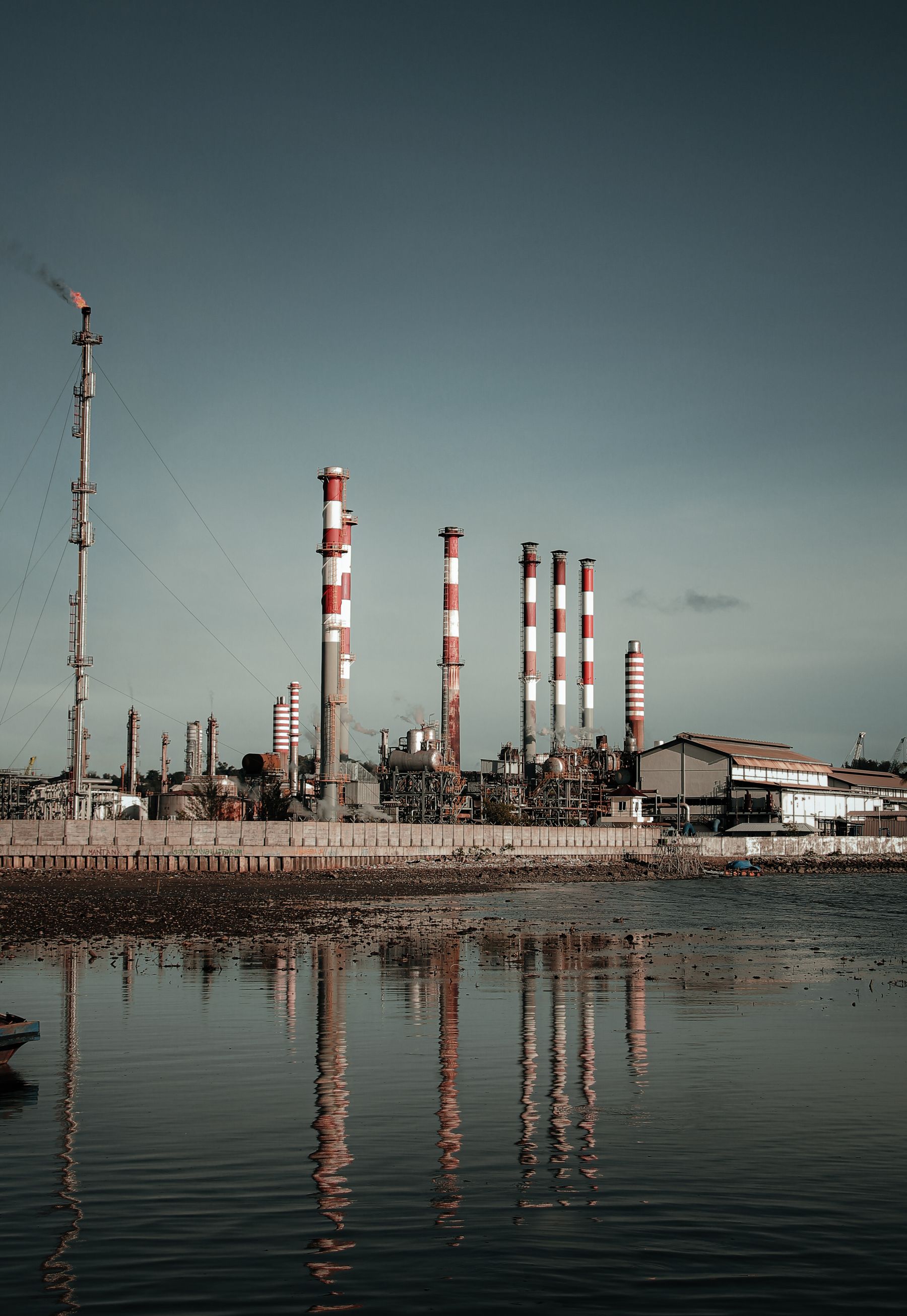 Industrial energy generation facility by a reservoir